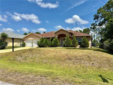 1163 Damen St E, Lehigh Acres, FL 33974 - photo 2