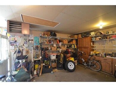 The garage is insulated, heated and has a water sp