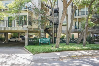 View of property with a carport