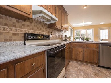 Kitchen with new vinyl tile flooring, countertop, 
