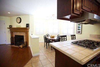 Kitchen opens to breakfast area and family room