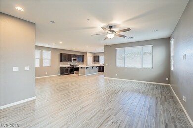Great room, kitchen and dining area