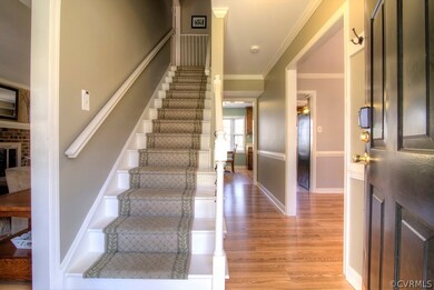 The foyer greets you with the dining room and fami