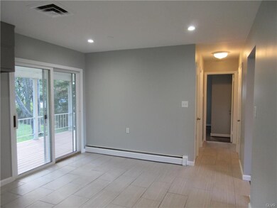 Tile floor leads to 1st floor Bedrooms & updated F