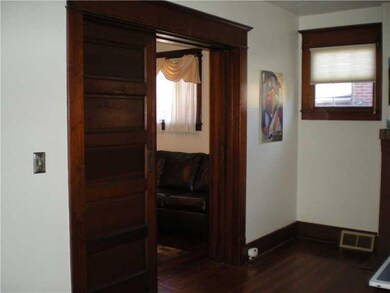 Living Room. Beautiful working pocket doors betwee