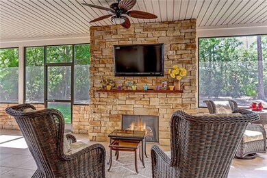 Stacked stone gas fireplace with remote control an