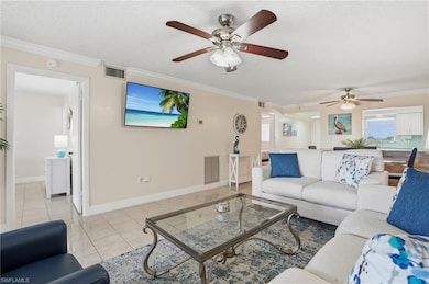 LIVING AREA NICELY FURNISHED WITH COASTAL COLORS