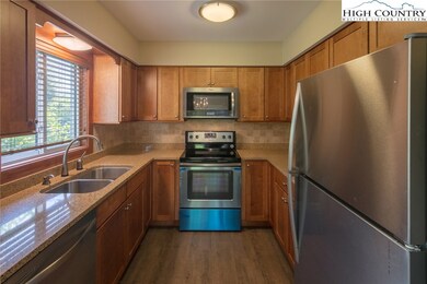 Lovely kitchen featuring Stone counter tops, ALL b