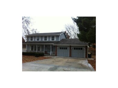 Three upper level bedrooms and two baths make this