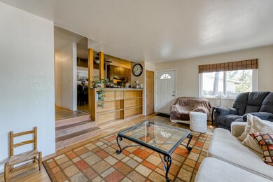 Built in bookshelf, view into kitchen