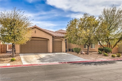 View of front facade featuring concrete driveway,