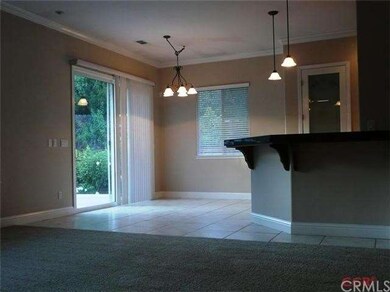 Big dining nook and breakfast bar open to the kitc