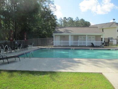 community pool included in minimal $50/mo association dues which also includes lawncare