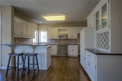 Granite Countertops and Stainless Steel Gas Stove