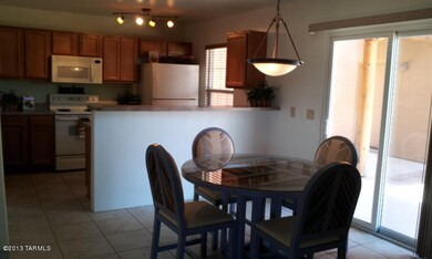 From entrance, kitchen and dining area.