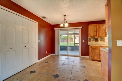 Dining Area open to Kitchen and to back porch
