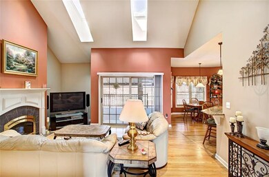 Vaulted great room bright & open with skylights