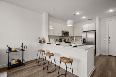 Kitchen featuring stainless steel appliances, a p