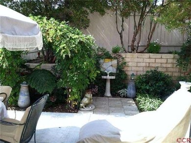 Backyard serenity is visibly enjoyed from indoor b