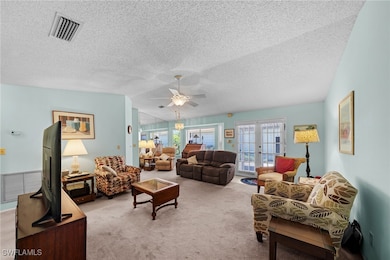 Living room from the front entrance, high ceiling