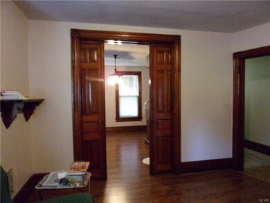 View from dining room to living room, original poc