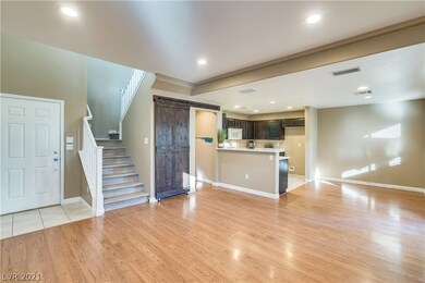 Open Living room to kitchen and dining area.   New