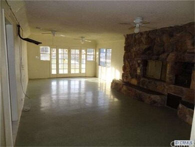 Den with fireplace