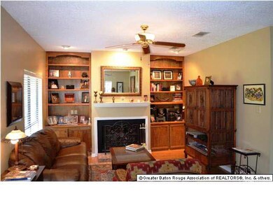 LIVING ROOM HAS FIREPLACE AND BUILTINS