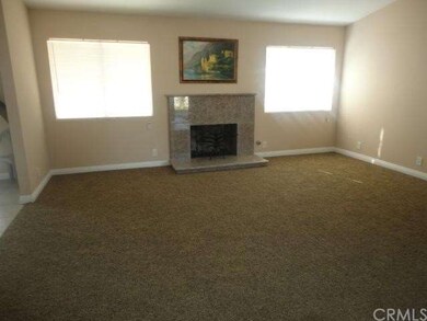 Living Room with Granite Fireplace