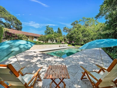 Pool with automatic cover and solar heat.,