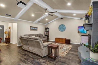 Living room with a ceiling fan, a fireplace, dark wood-type flooring, baseboards, and recessed lighting