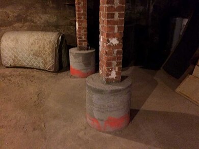 View. NEWLY INSTALLED BASEMENT CENTER GIRDERS