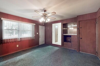 Family with Door to Rear Deck