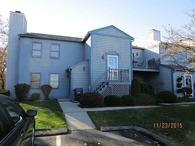 Exterior Front. STAIRS TO ONE LEVEL UNIT WITH KITC