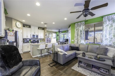 Light and airy view of the living/kitchen/dining a