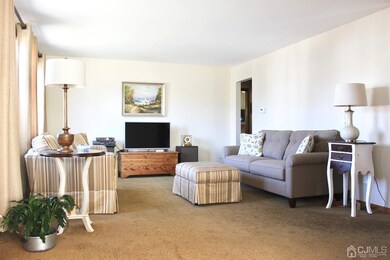 The living room is spacious and light filled.