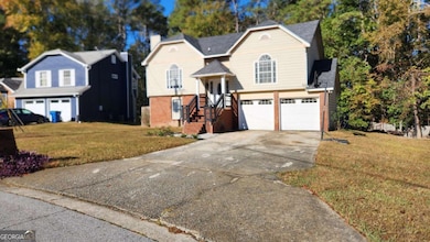 6305 Emerald Pointe Cir, Atlanta, GA 30349 - photo 2