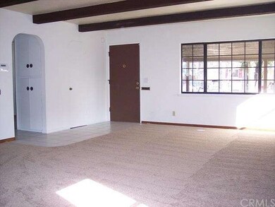 Living/Family Room towards front door;  NEW carpet