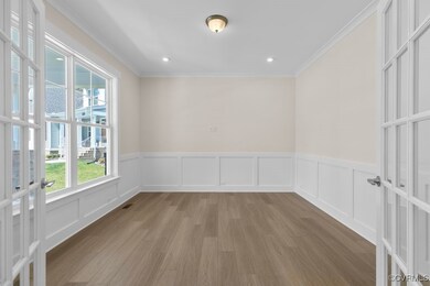 The private home office is tucked at the front of