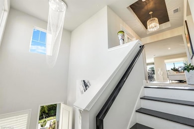 Stairs with upgraded chandeliers