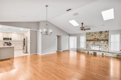 Living room Dining room with fireplace