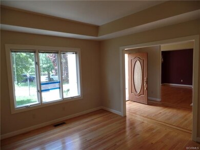 Views of Living Room, Foyer, and Dining Room