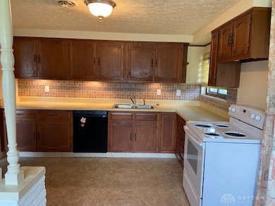 Kitchen with stove, ref, dishwasher