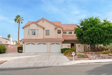 Mediterranean / spanish home featuring stucco siding, concrete driveway, a garage, and a tiled roof