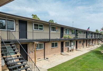 View of building exterior featuring stairs