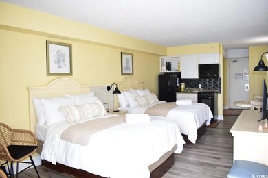 Bedroom featuring dark hardwood / wood-style floor