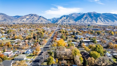 Mountain view featuring nearby suburban area