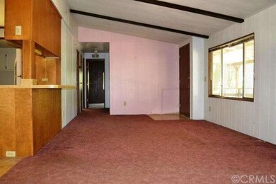 Kitchen on the left, entryway on the right, hall b