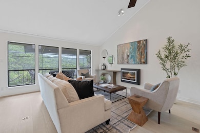 Living area with high vaulted ceiling, healthy am
