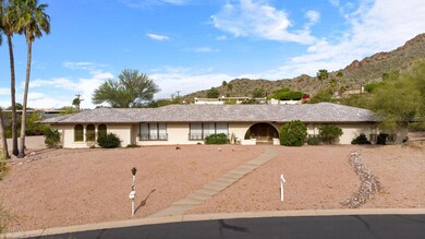 6554 N 40th Pl-large-003-004-Front Exter